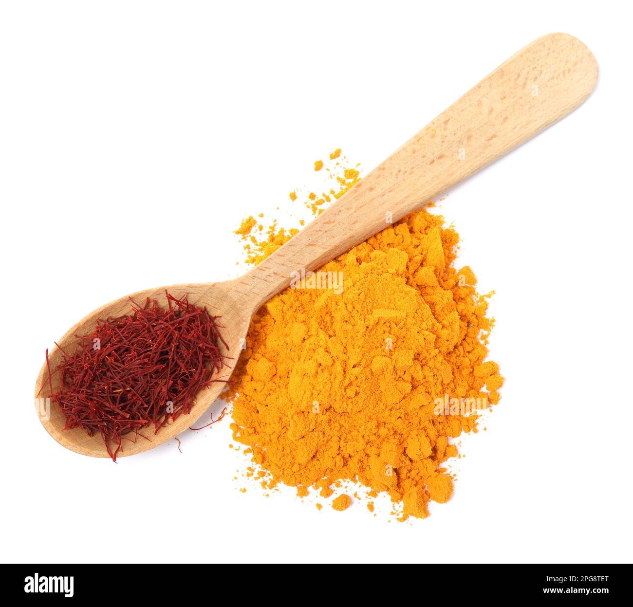 Spoon of dried flower stigmas and saffron powder on white background