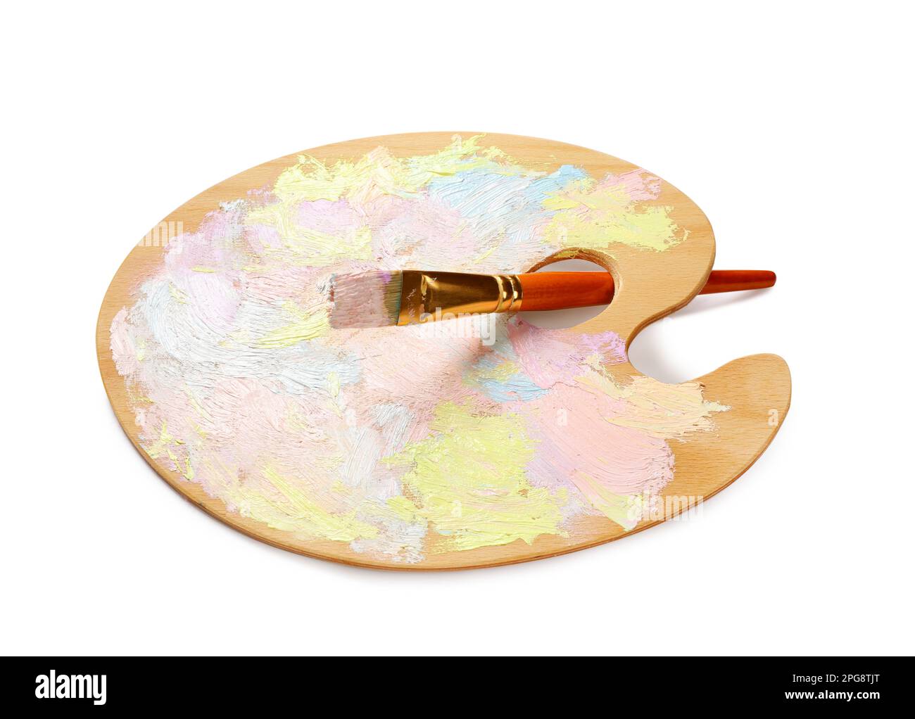 Wooden artist's palette with mixed pastel paints and brush isolated on