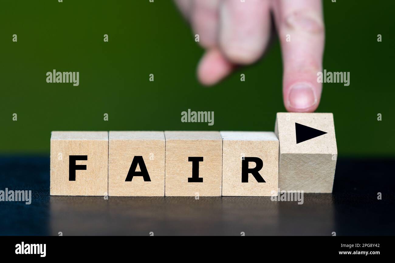 The 'play' symbol in combination with the word 'fair' create the expression 'fair play'. Stock Photo