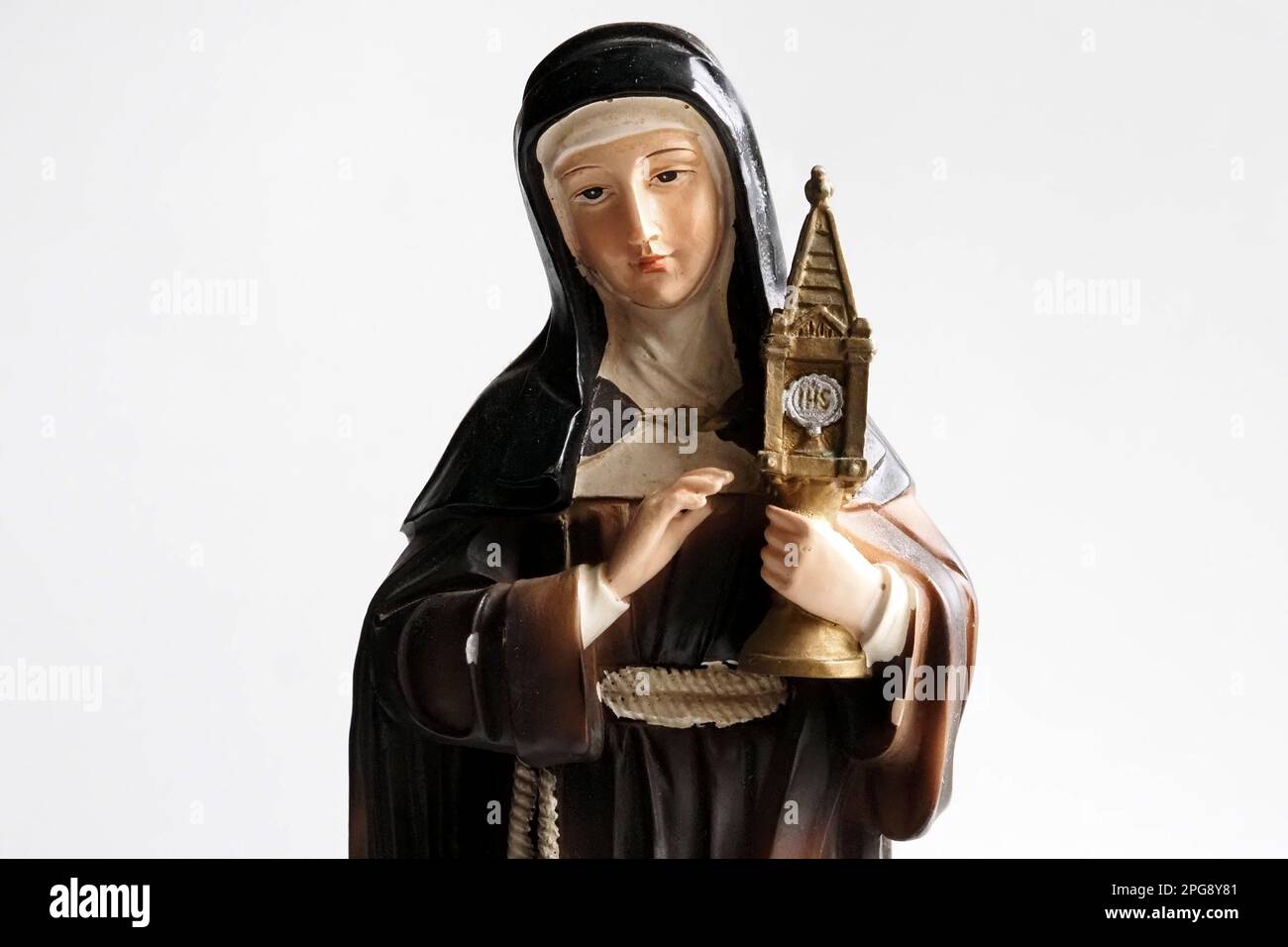 Caserta, Italy. 21st Mar, 2023. In this Illustration. Statuette symbolizing Santa Chiara, founder of the order of the Poor Clares. She was canonized as Santa Chiara in 1255, while on 17 February 1958 she was declared by Pius XII she was the patron saint of television and telecommunications. Italy, 20 Mar, 2023. (photo by Vincenzo Izzo/Sipa USA) Credit: Sipa USA/Alamy Live News Stock Photo