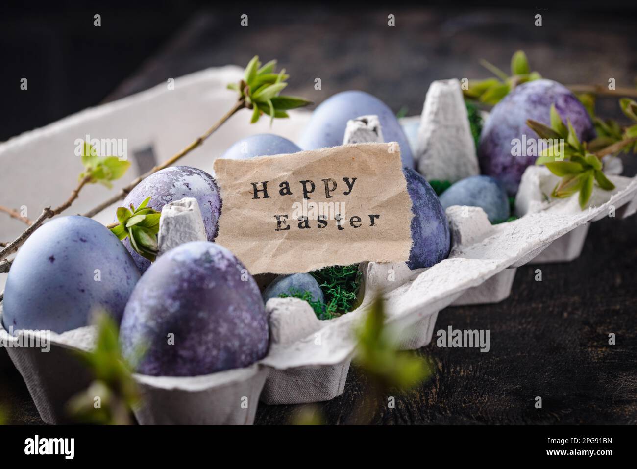 Festive Easter eggs in purple and blue color Stock Photo - Alamy