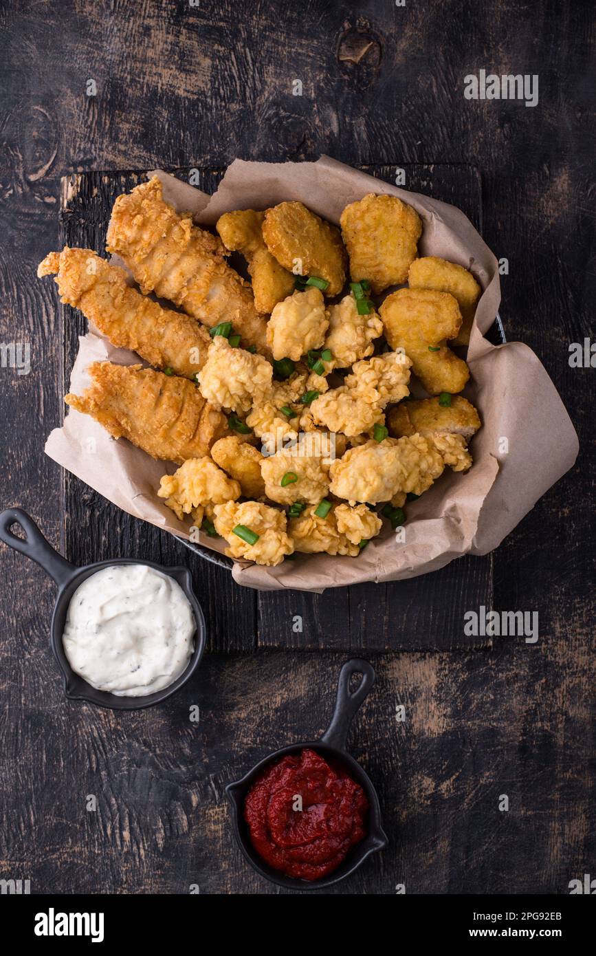 Chicken nuggets, strips and bites Stock Photo Alamy