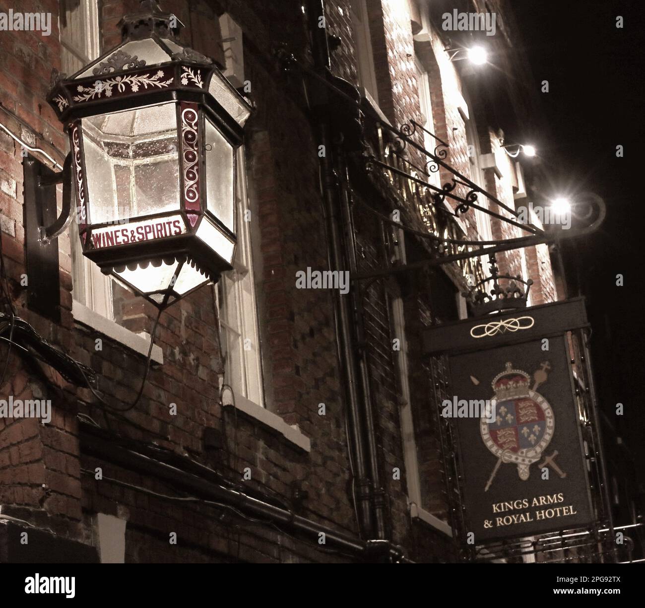 Sepia High Street, Kings Arms & Royal Hotel, Godalming, Waverley, Surrey, England, UK, GU7 1EB, at night Stock Photo
