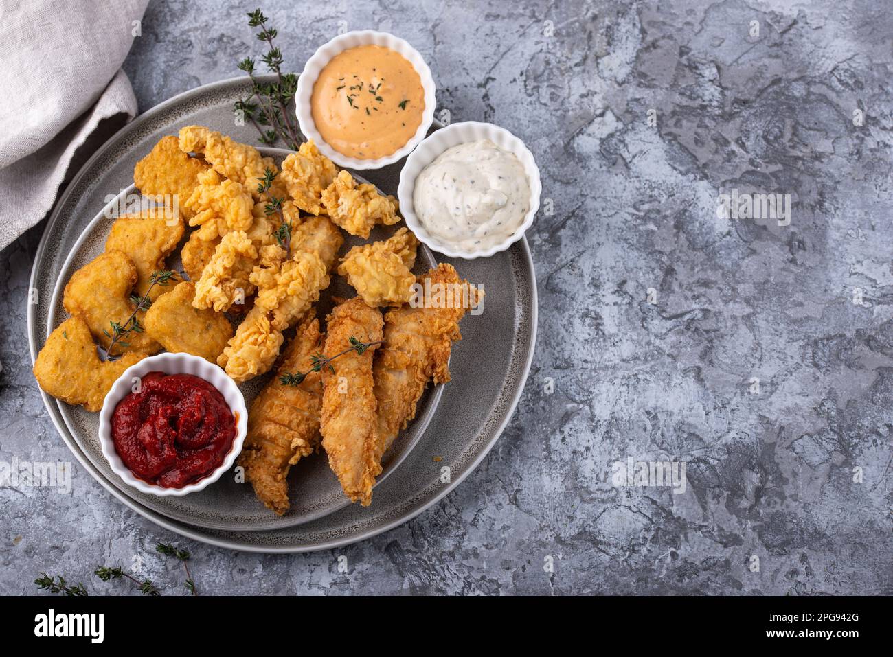 Chicken nuggets, strips and bites Stock Photo Alamy