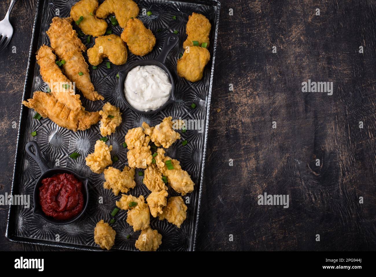 Chicken nuggets, strips and bites Stock Photo Alamy