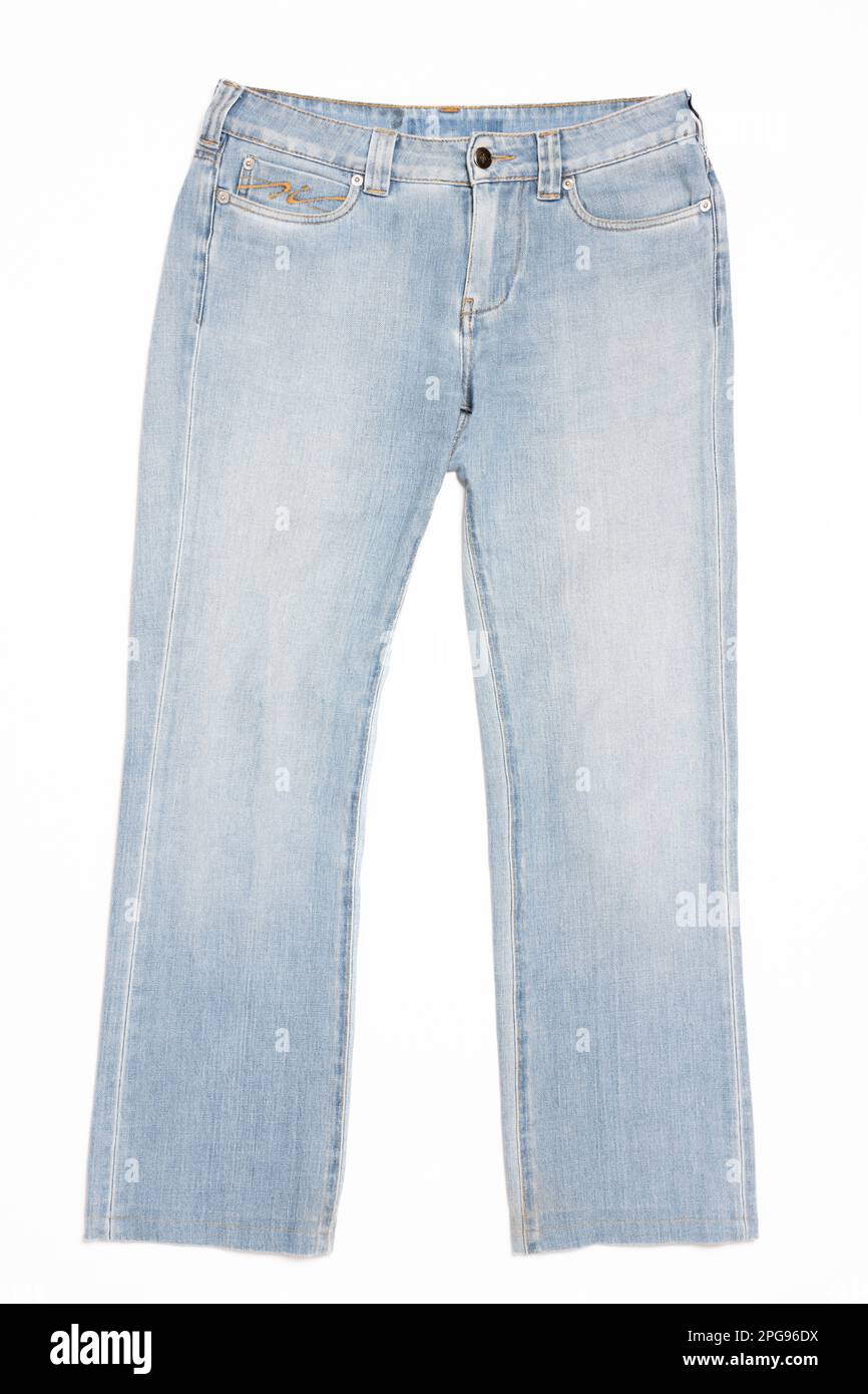 Still life. Studio shot detail of a woman's blue jeans pants, laid flat