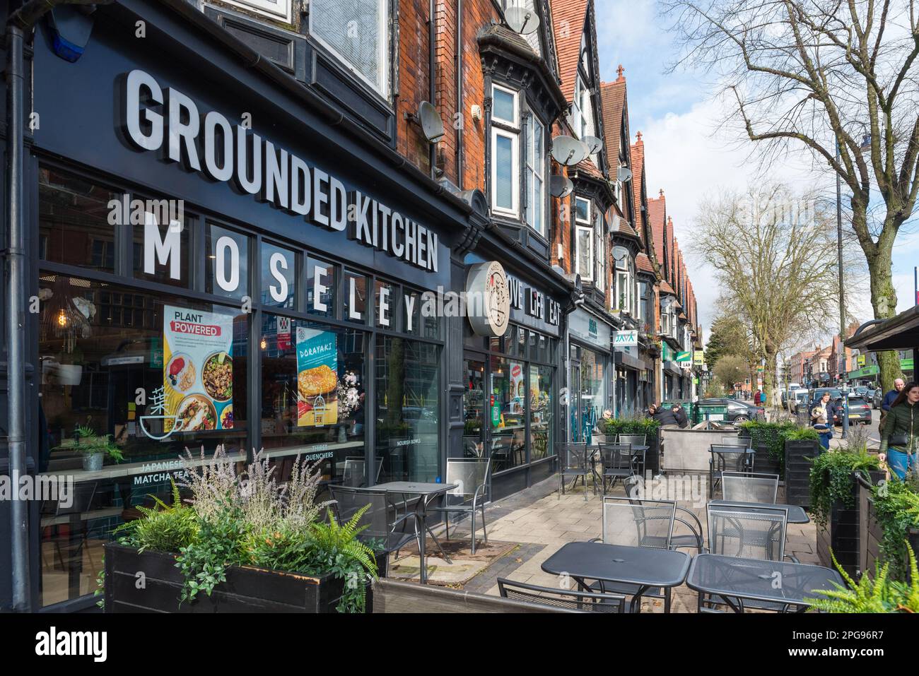 Outdoor seating on the pavement at the Grounded Kitchen coffee shop in