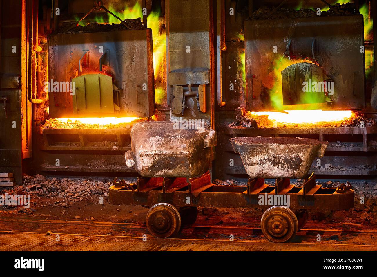 Reverberatory furnaces melt copper with flame in Stock Photo