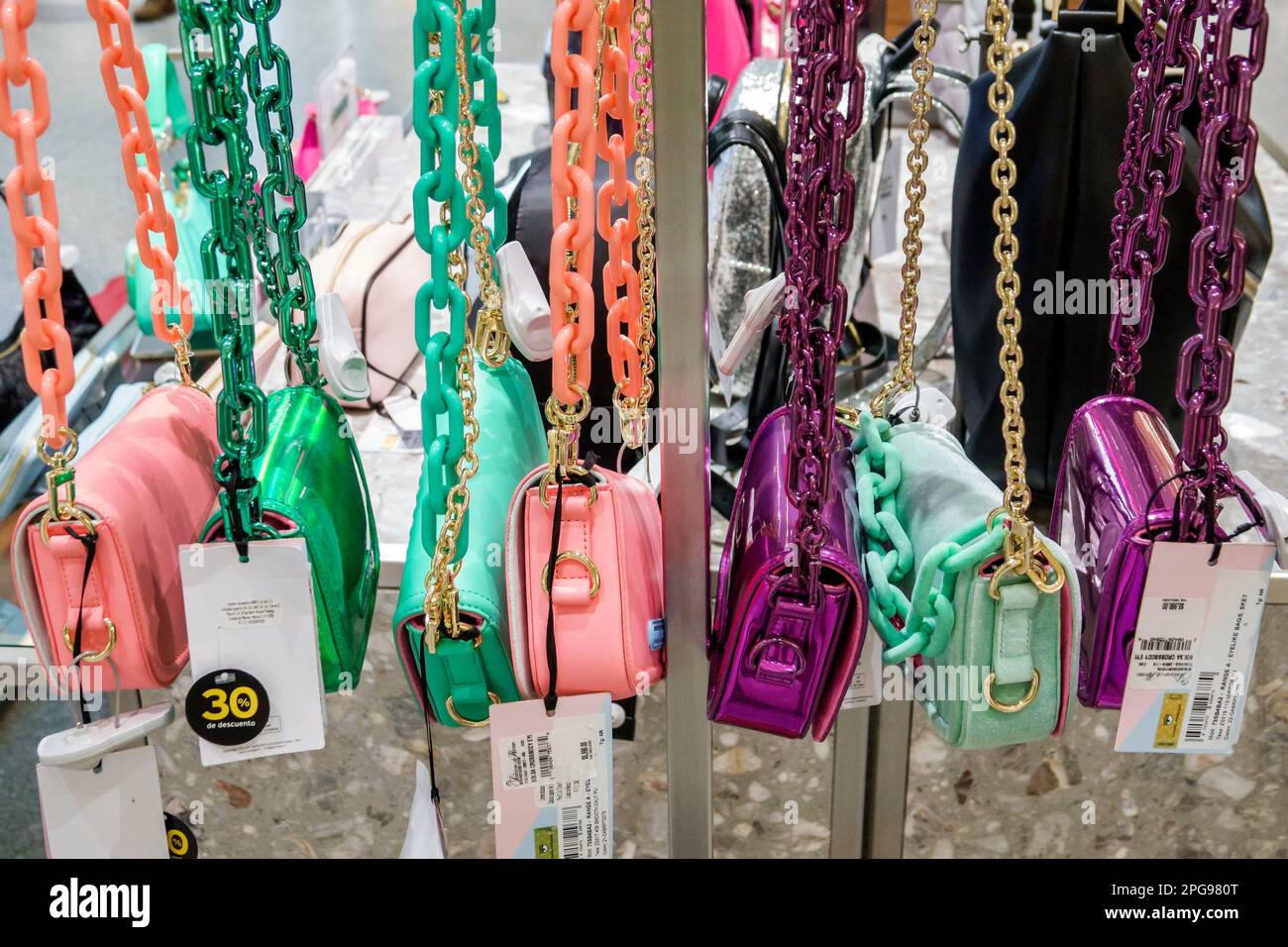 Luxury designer handbags on display in a Singapore shopping mall Stock  Photo - Alamy