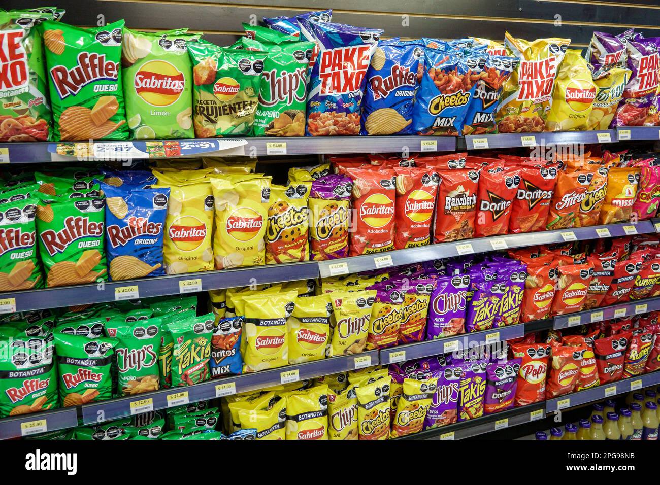 Mexico City,GOmart,snacks chips Ruffles Sabritas,bags packages junk food chips,inside interior indoors,convenience food store grocery groceries stores Stock Photo
