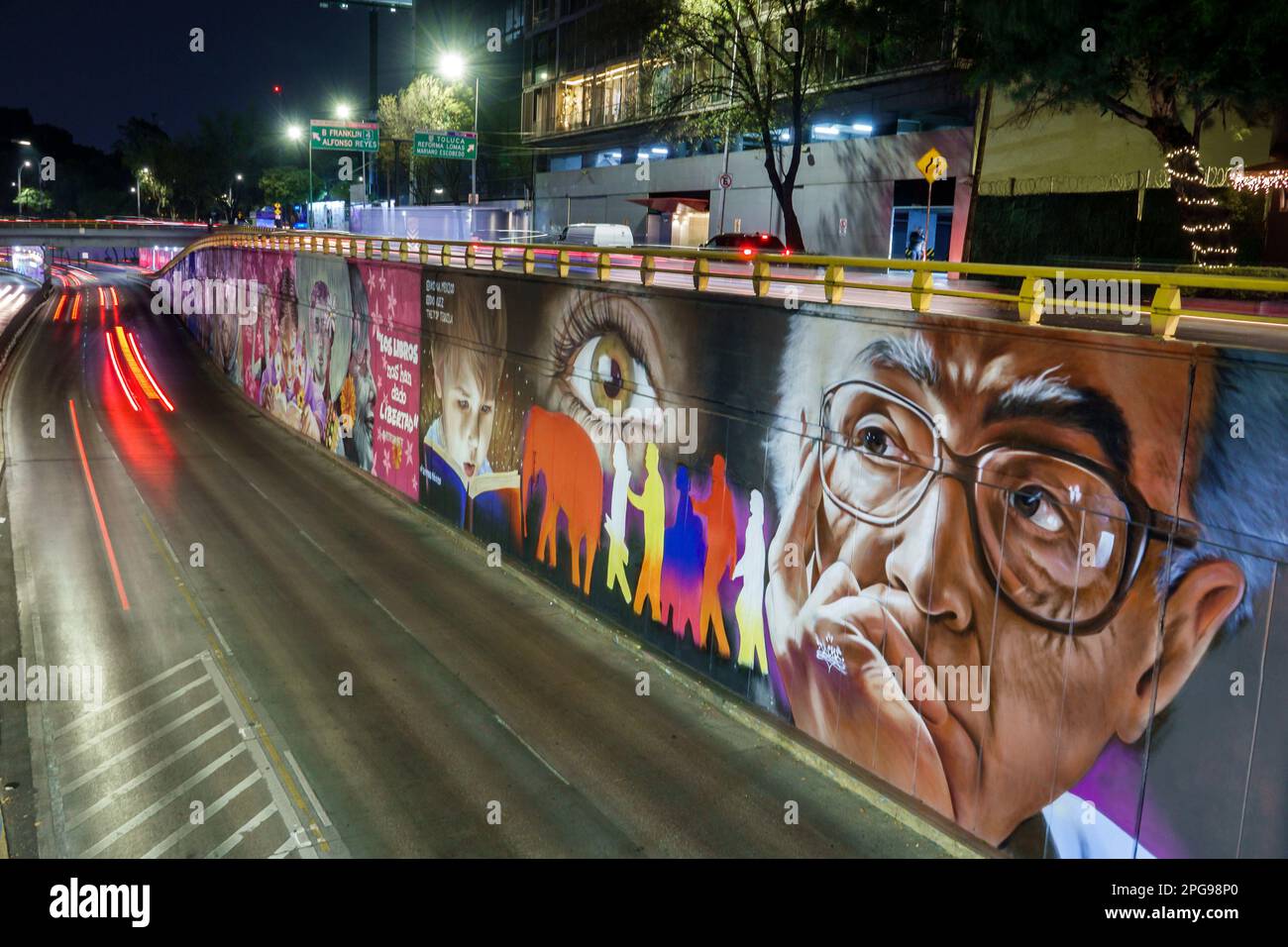 Mexico City,Circuito Interior Melchor Ocampo highway traffic mural murals by Lizette Charlotte,night nighttime vehicle light trails Stock Photo