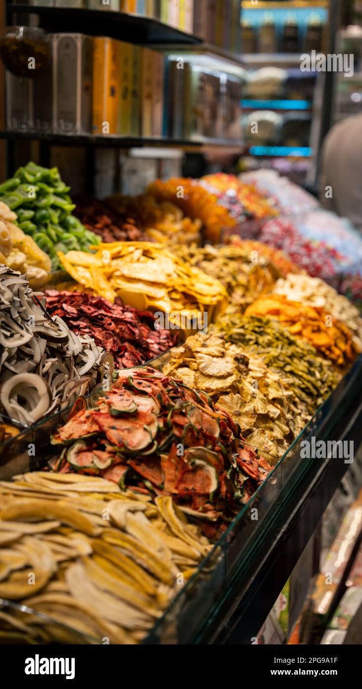 A tantalizing image of an outdoor marketplace, featuring an abundant selection of dried fruit Stock Photo