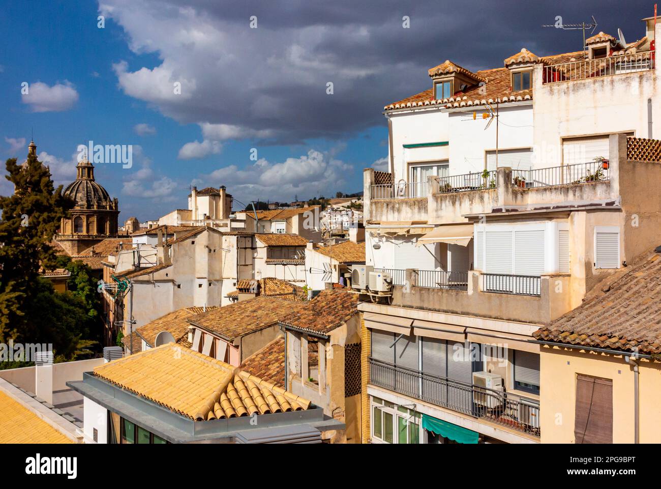View across rooftops in the city of Granada in Andalucia southern Spain in the area close to the cathedral. Stock Photo
