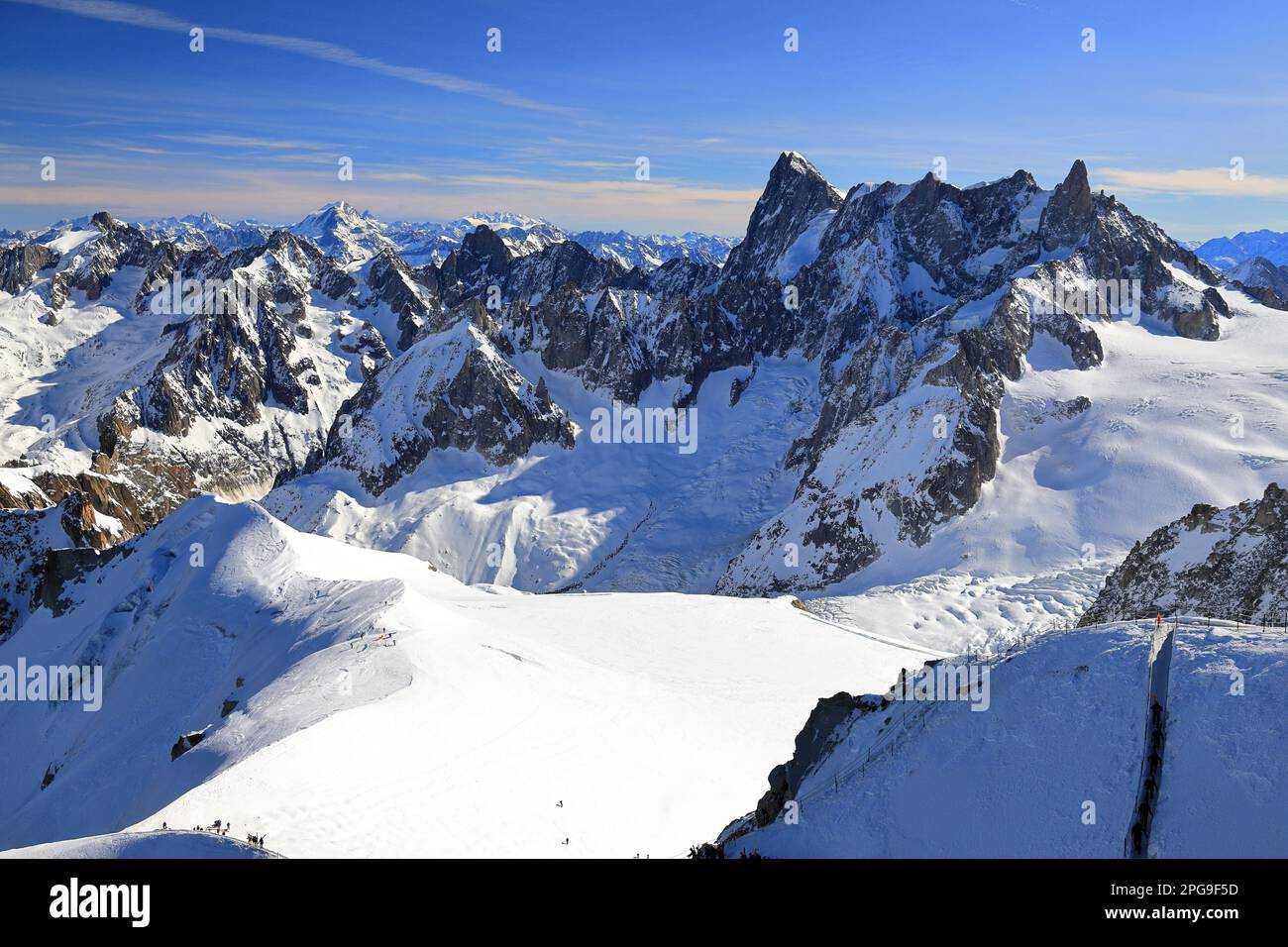 View of the glacier valley of the Mont Blanc massif seen from the Aiguille du Midi. French Alps, Europe. Stock Photo