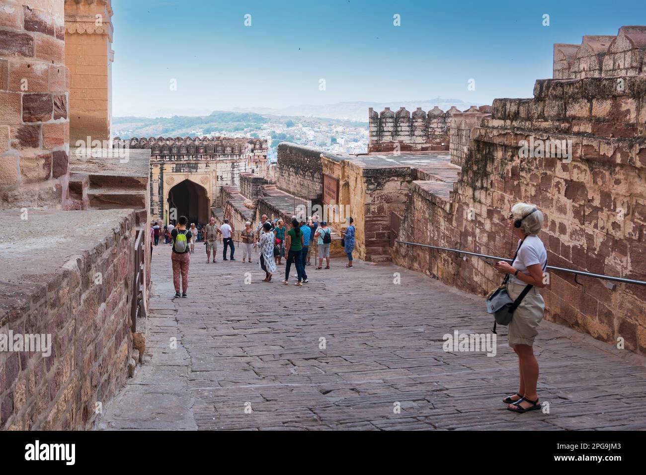 Jodhpur, Rajasthan, India - 19th October 2019 : Foreigner woman tourist visiting famous Mehrangarh fort, Mehrangarh Fort is UNESCO world heritage site Stock Photo