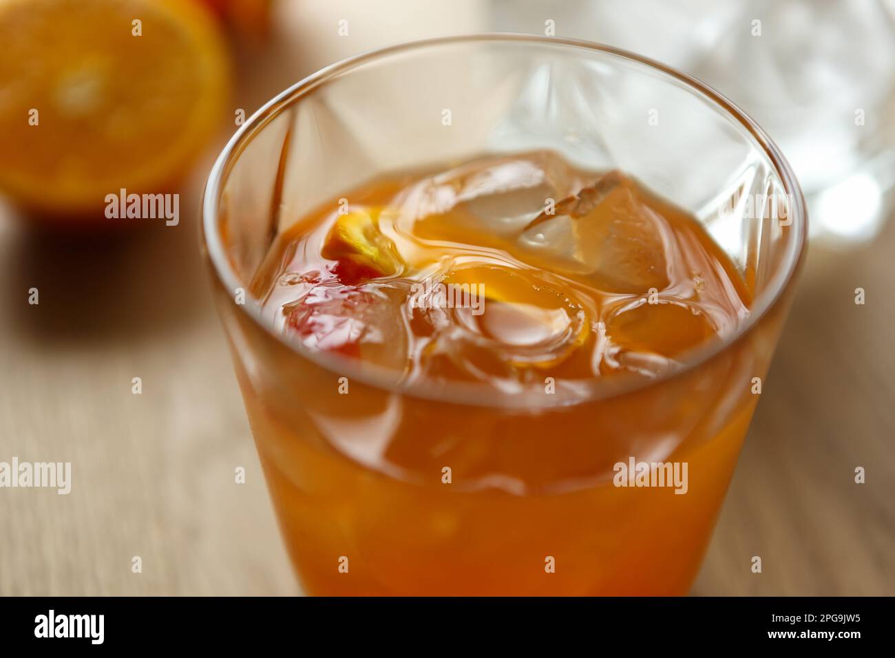 Glass of spritz bitter drink served in a bar. Refreshing orange