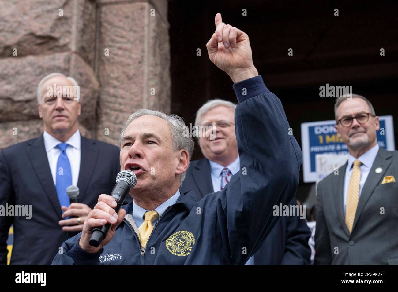 Republican Texas Gov. GREG ABBOTT waits as he headlines a rally for 'school choice' to a crowd of about 150 on the north steps of the Texas Capitol. Republican legislators have repeatedly tried to pass measures that would use public education money to fund vouchers that parents would use to bypass Texas public schools for private education. Behind Abbott are Republican lawmakers State Rep. JAMES FRANK, l, Sen. PAUL BETTENCOURT and Sen. KEVIN SPARKS. Credit: Bob Daemmrich/Alamy Live News Stock Photo