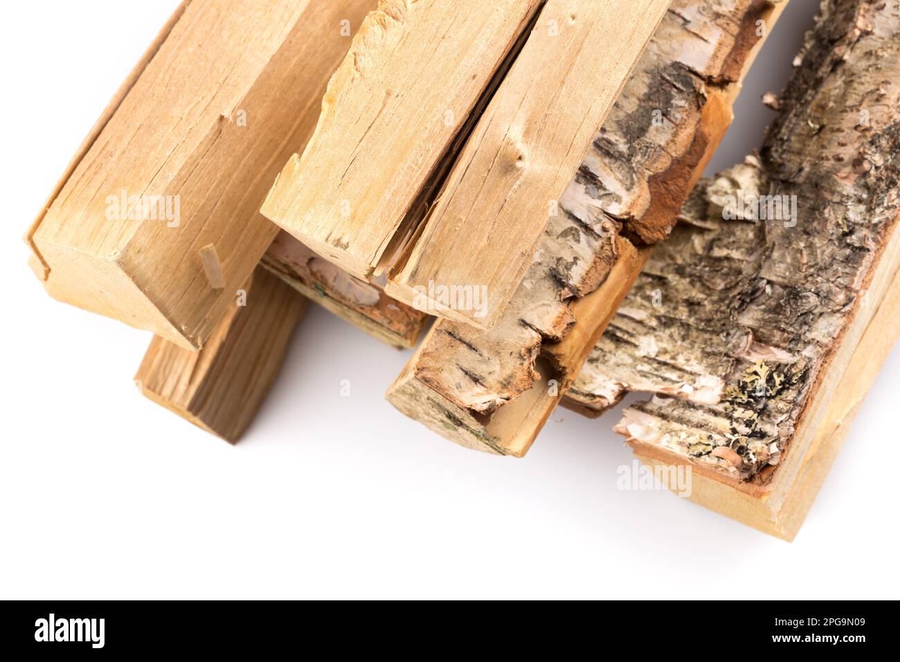 Stack of cut logs firewood from silver birch tree isolated on white  background Stock Photo - Alamy