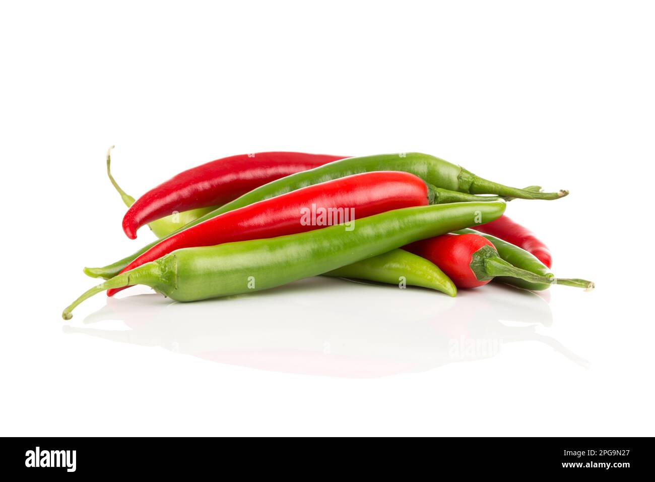 Green and red chili pepper isolated on white background Stock Photo - Alamy