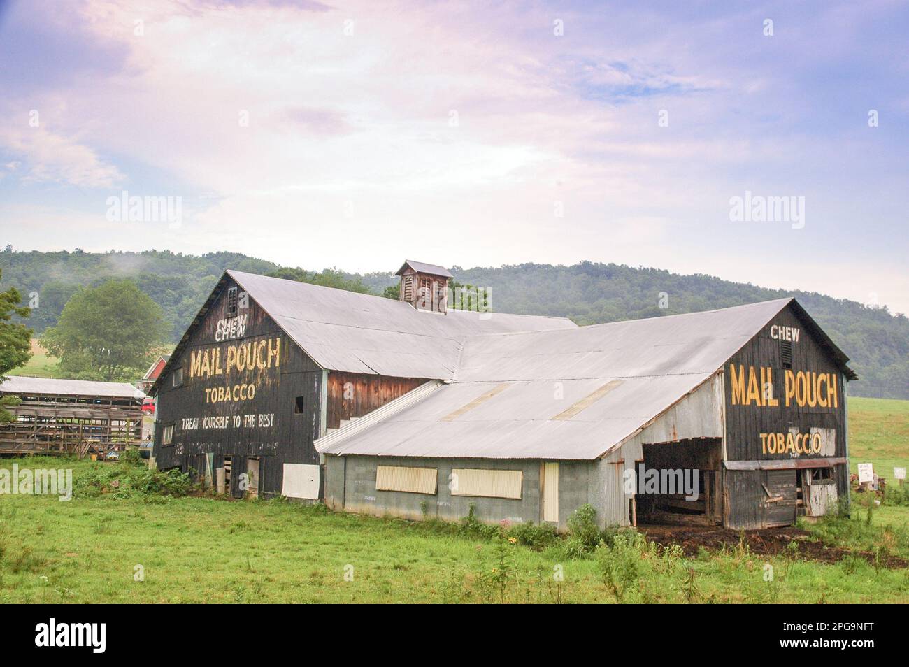 Rural scene showing a Westmorland County, Western PA barn with Mail