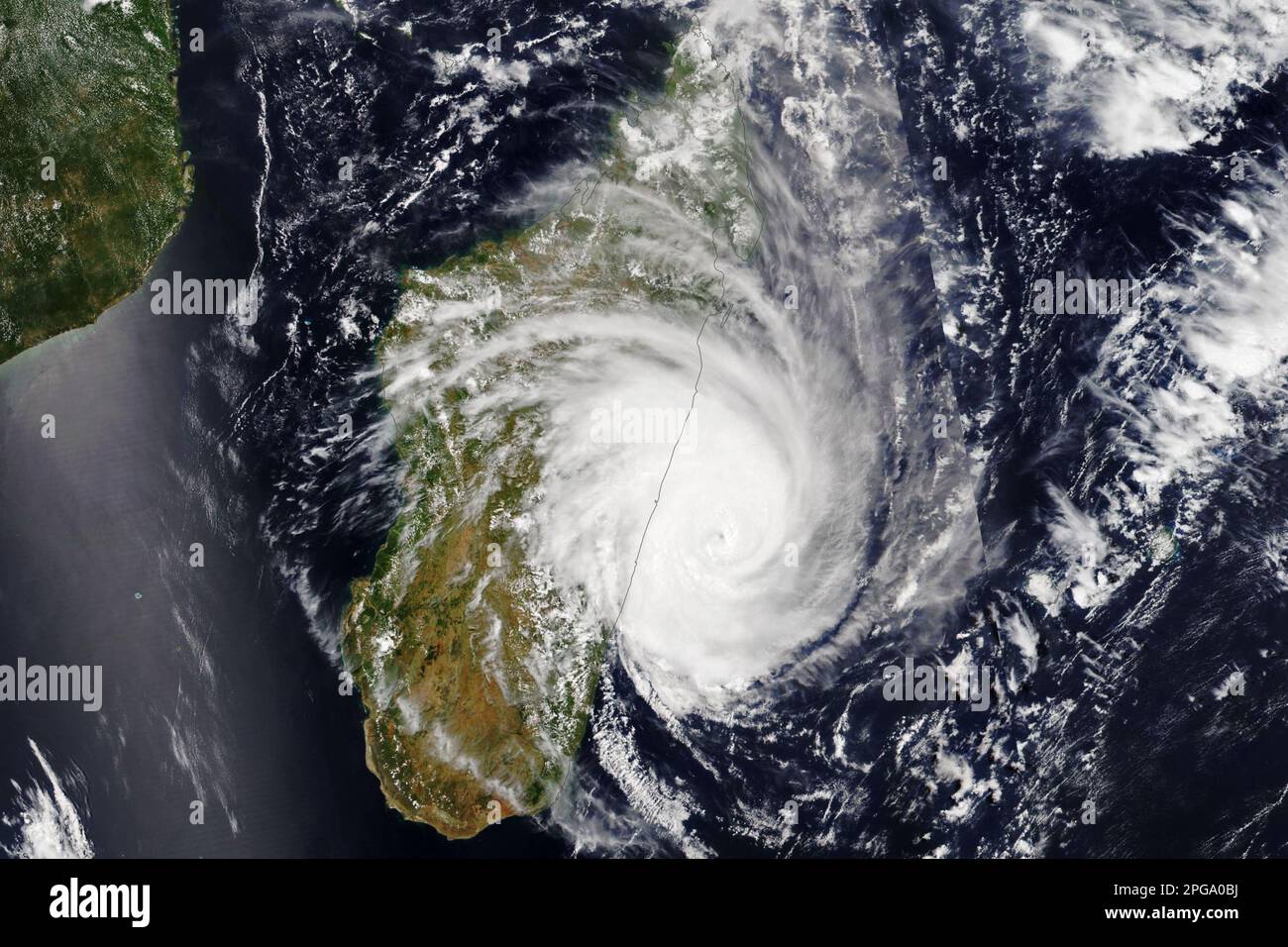 After traveling for 15 days across the Indian Ocean, Tropical Cyclone Freddy made landfall on the east coast of Madagascar on the evening of February 21, 2023. This image shows Freddy just east of Madagascar at 1:50 p.m. local time (10:50 Universal Time) on February 21. It was acquired by the Visible Infrared Imaging Radiometer Suite (VIIRS) on the NOAA-20 satellite. As Freddy made landfall north of Mananjary around 7:20 p.m. local time, its winds measured about 130 kilometers (80 miles) per hour, but precise wind speeds at landfall were yet to be confirmed. The coastal town of Mananjary, home Stock Photo