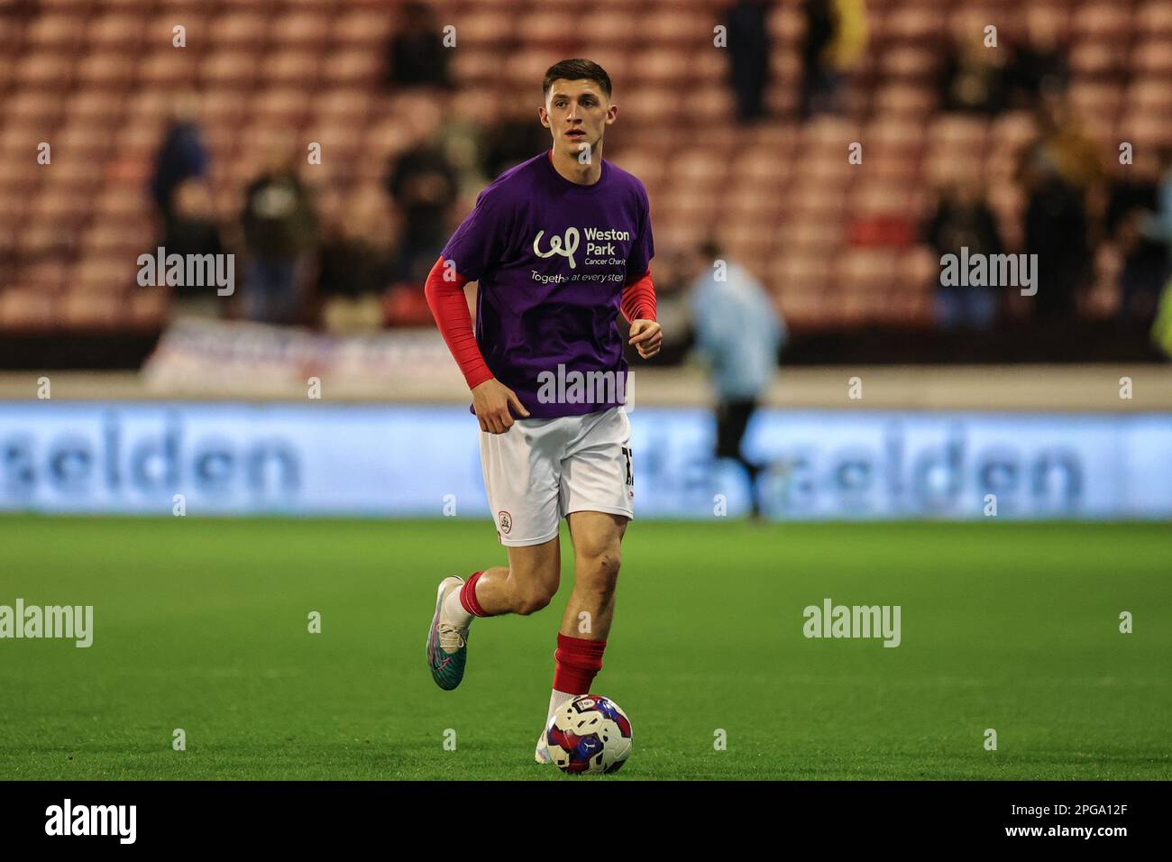 Bobby Thomas #12 of Barnsley in the pregame warmup session during the Sky Bet League 1 match Barnsley vs Sheffield Wednesday at Oakwell, Barnsley, United Kingdom, 21st March 2023  (Photo by Mark Cosgrove/News Images) Stock Photo