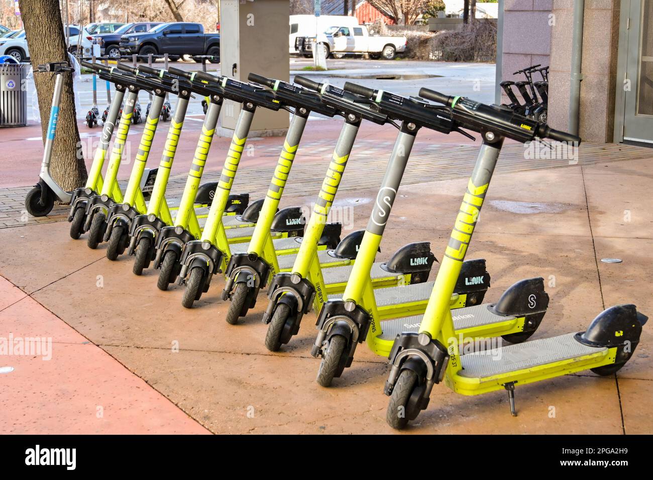 Scooter Rent Building Rental scooters lined up on a street hi-res stock photography and ...