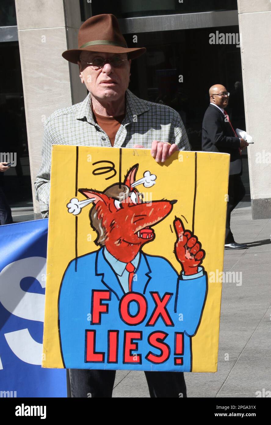 New York, NY, USA. 21st Mar, 2023. Anti-Fox News protestor seen outside FOX Plaza on the day of Donald Trump's indictment at the News Corporation building in New York City on March 21, 2023. Credit: Rw/Media Punch/Alamy Live News Stock Photo