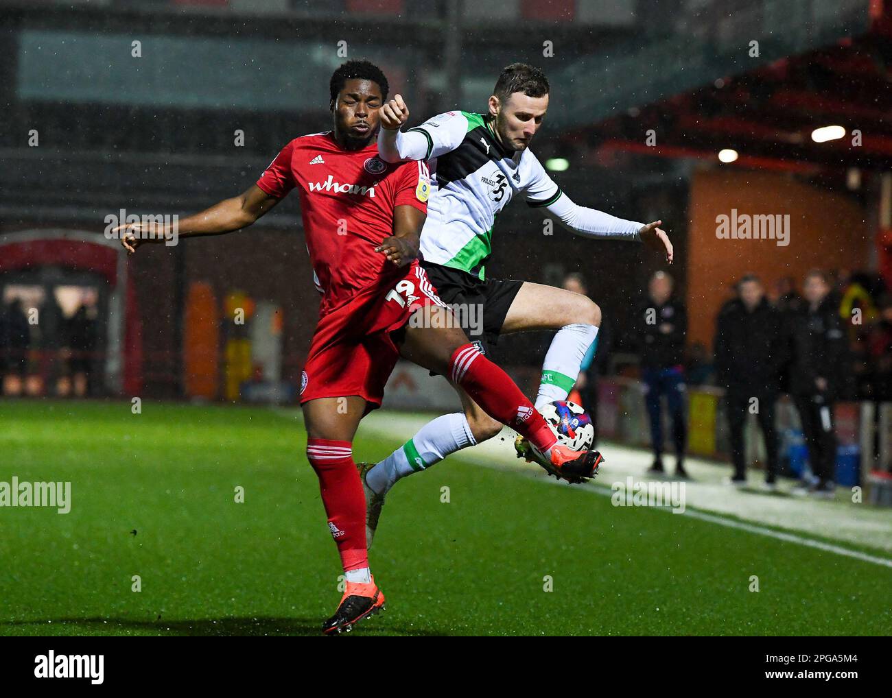 Macaulay Gillesphey #3 of Plymouth Argyle battles for the ball during the Sky Bet League 1 match Accrington Stanley vs Plymouth Argyle at Wham Stadium, Accrington, United Kingdom, 21st March 2023  (Photo by Stan Kasala/News Images) Stock Photo