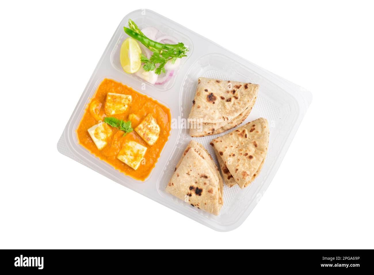 Top view of shahi paneer with tawa roti in disposable plate isolated on white background with clipping path Stock Photo