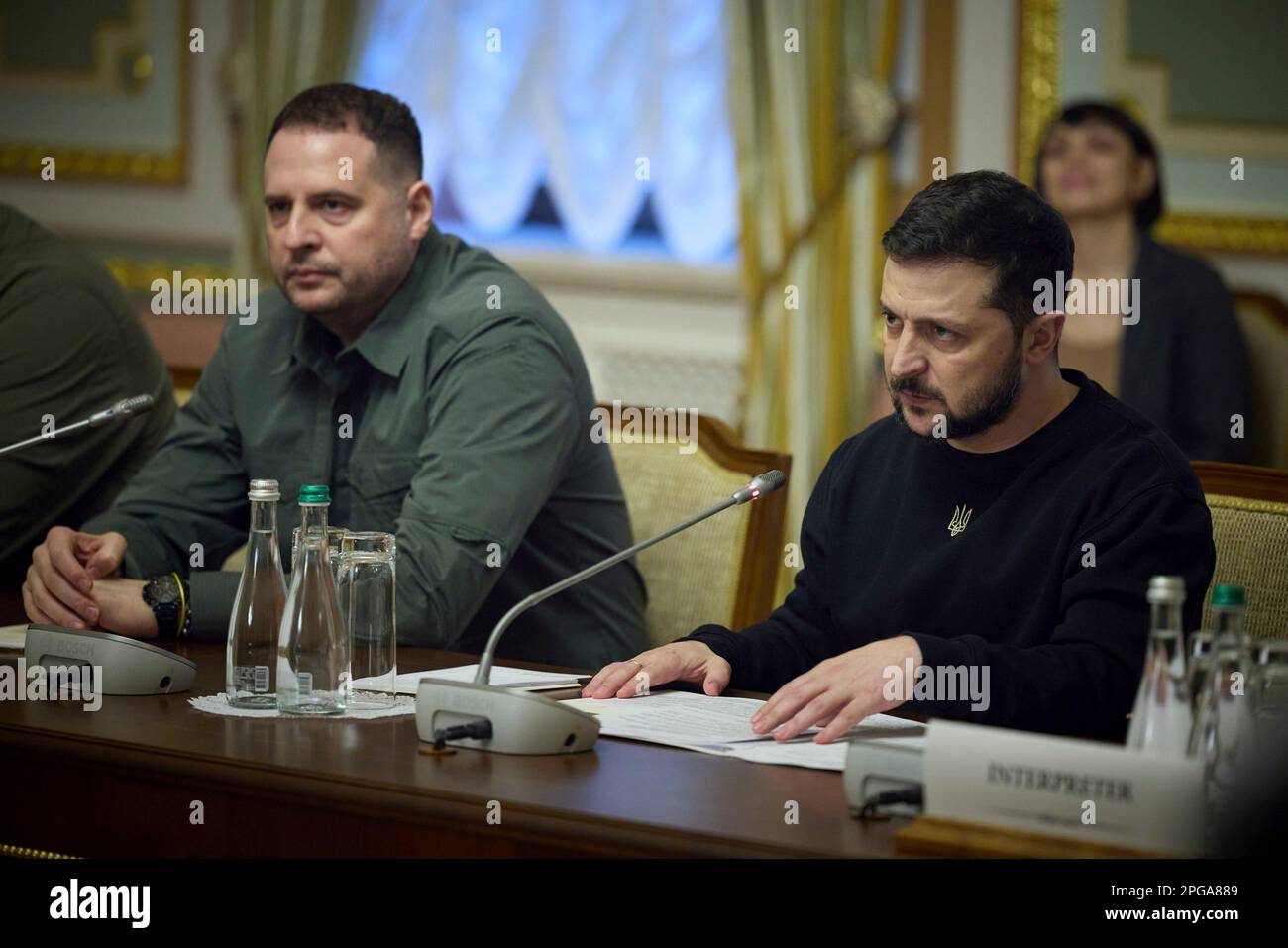 Kyiv, Ukraine. 21st Mar, 2023. Ukrainian President Volodymyr Zelenskyy, right, listens during an extended bilateral meeting with visiting Japanese Prime Minister Fumio Kishida, at the Mariinsky Palace, March 21, 2023 in Kyiv, Ukraine. Ukrainian chief of presidential staff Andrii Yermak is to the left. Credit: Pool Photo/Ukrainian Presidential Press Office/Alamy Live News Stock Photo