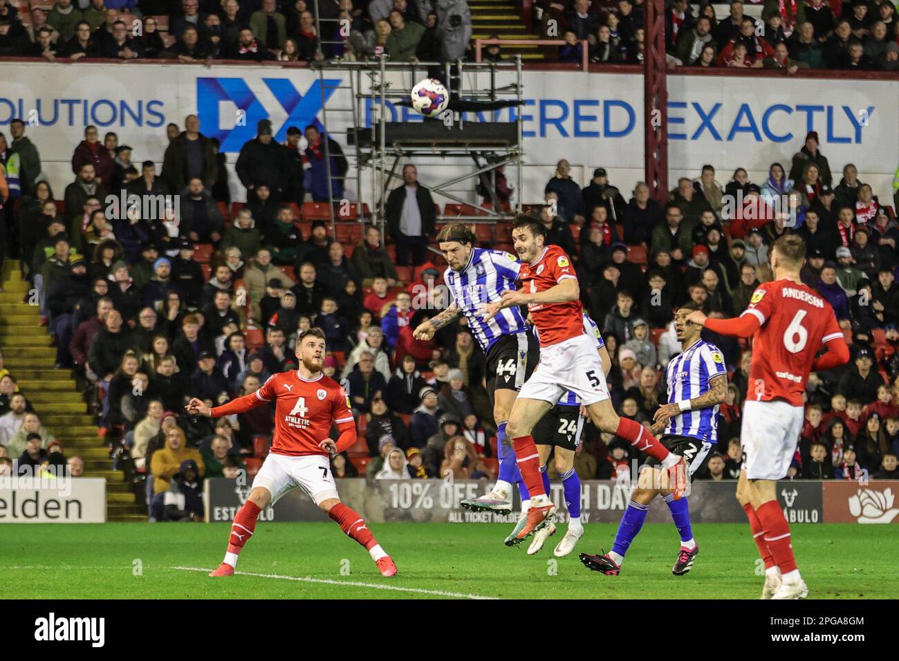 Aden Flint #44 of Sheffield Wednesday =heads n goal during the Sky Bet League 1 match Barnsley vs Sheffield Wednesday at Oakwell, Barnsley, United Kingdom, 21st March 2023  (Photo by Mark Cosgrove/News Images) Stock Photo