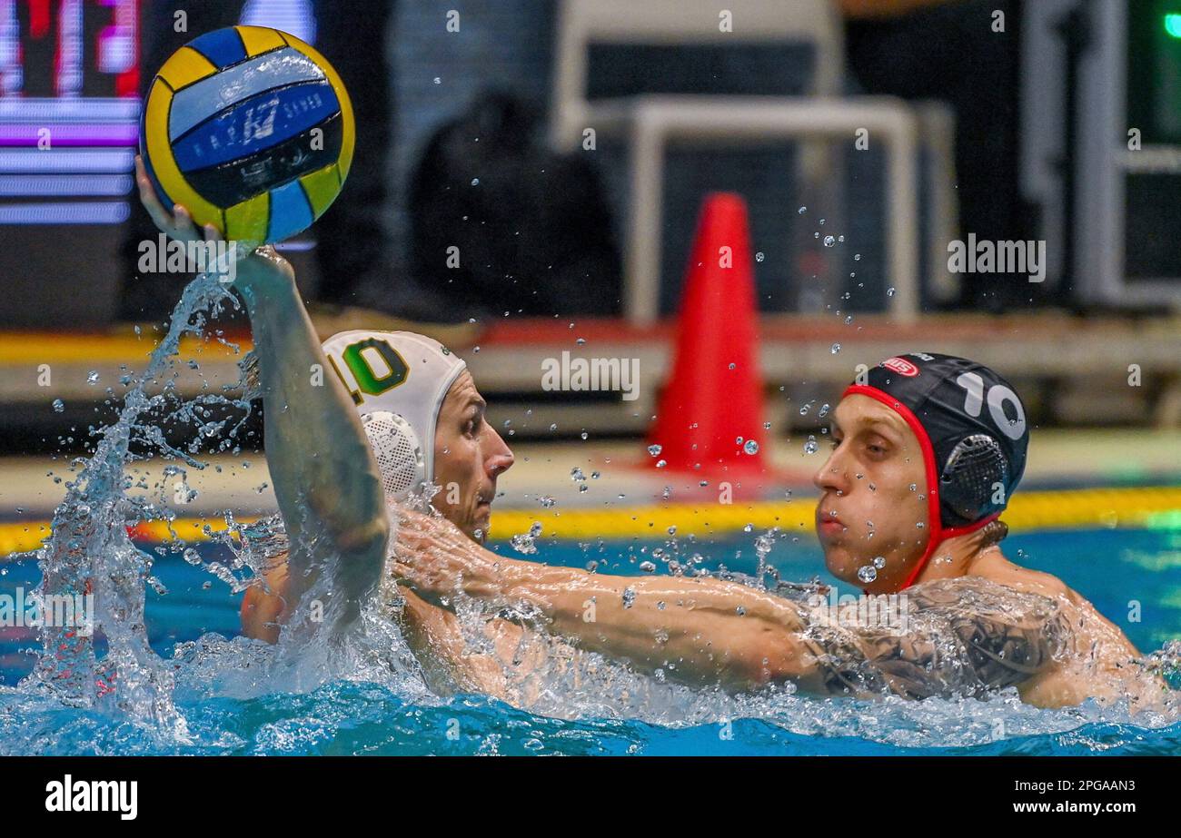 Denes Varga, left, of Ferencvaros in action against Dmitri Kholod of  Spandau Berlin during the men's water polo Champions' League 10th round  match between FTC Telekom and Spandau Berlin in Budapest, Hungary,