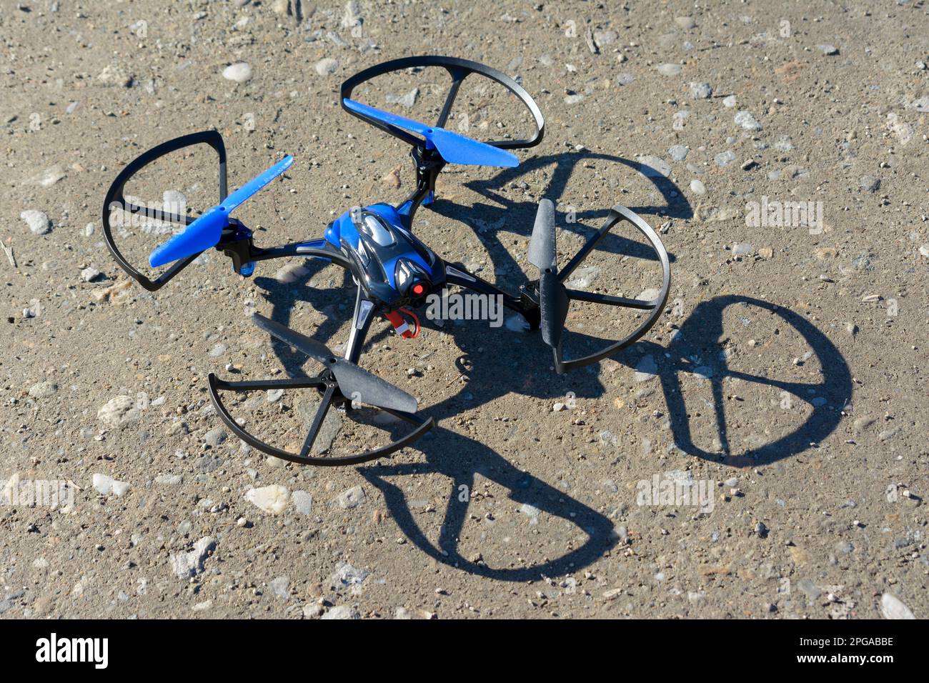 remote aerial quadcopter drone landing, with hight resolution camera, flying in the countryside, which makes a survey of the territory, Italy Stock Photo