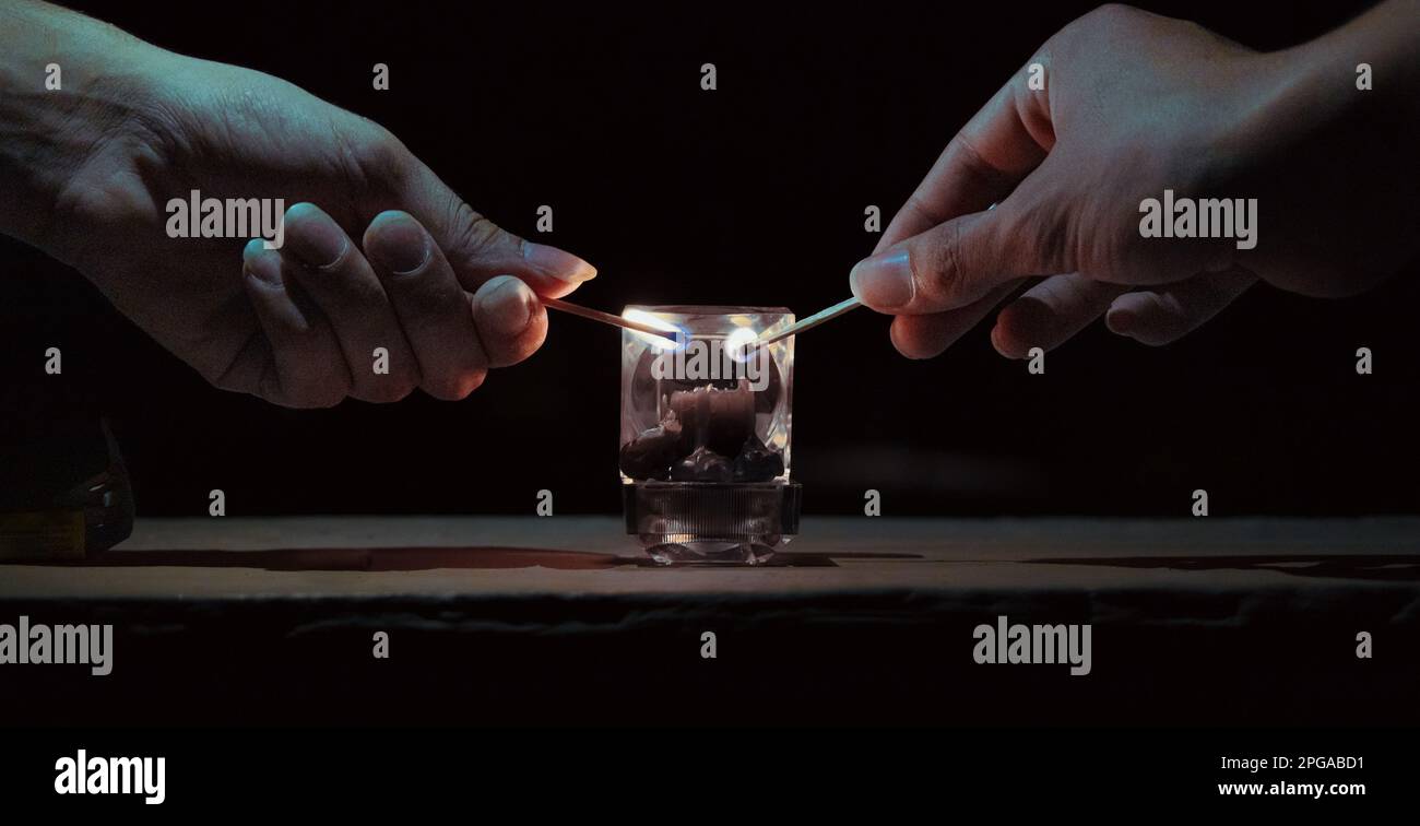 light up a candle Stock Photo Alamy