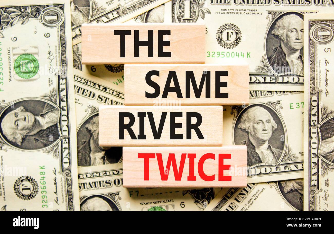 The same river twice symbol. Concept words The same river twice on wooden block. Beautiful