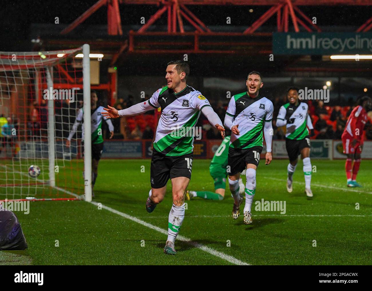Conor Grant #15 of Plymouth Argyle scores to make it 0-2 during the Sky Bet League 1 match Accrington Stanley vs Plymouth Argyle at Wham Stadium, Accrington, United Kingdom, 21st March 2023  (Photo by Stan Kasala/News Images) Stock Photo