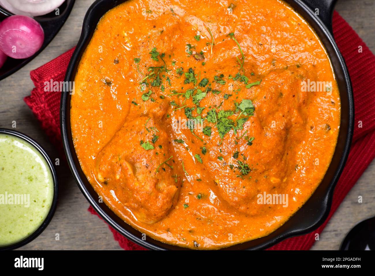 Butter chicken gravy top view Stock Photo Alamy