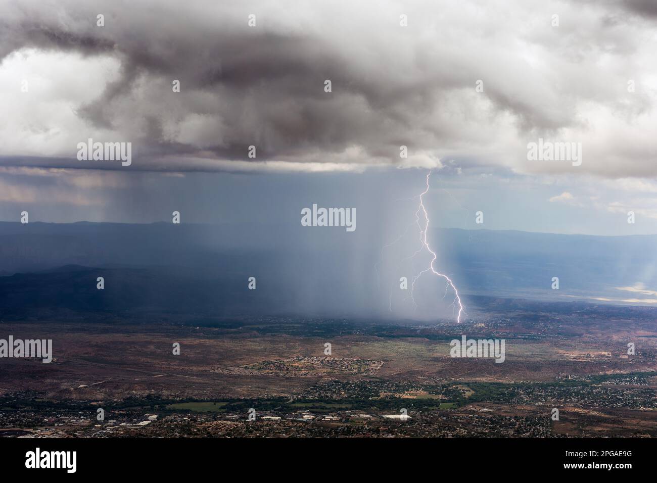 A monsoon thunderstorm with heavy rain and lightning over Cottonwood, Arizona Stock Photo