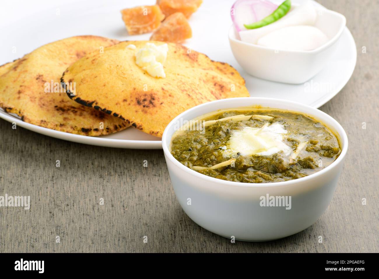 Sarson ka saag at dinner table Stock Photo Alamy