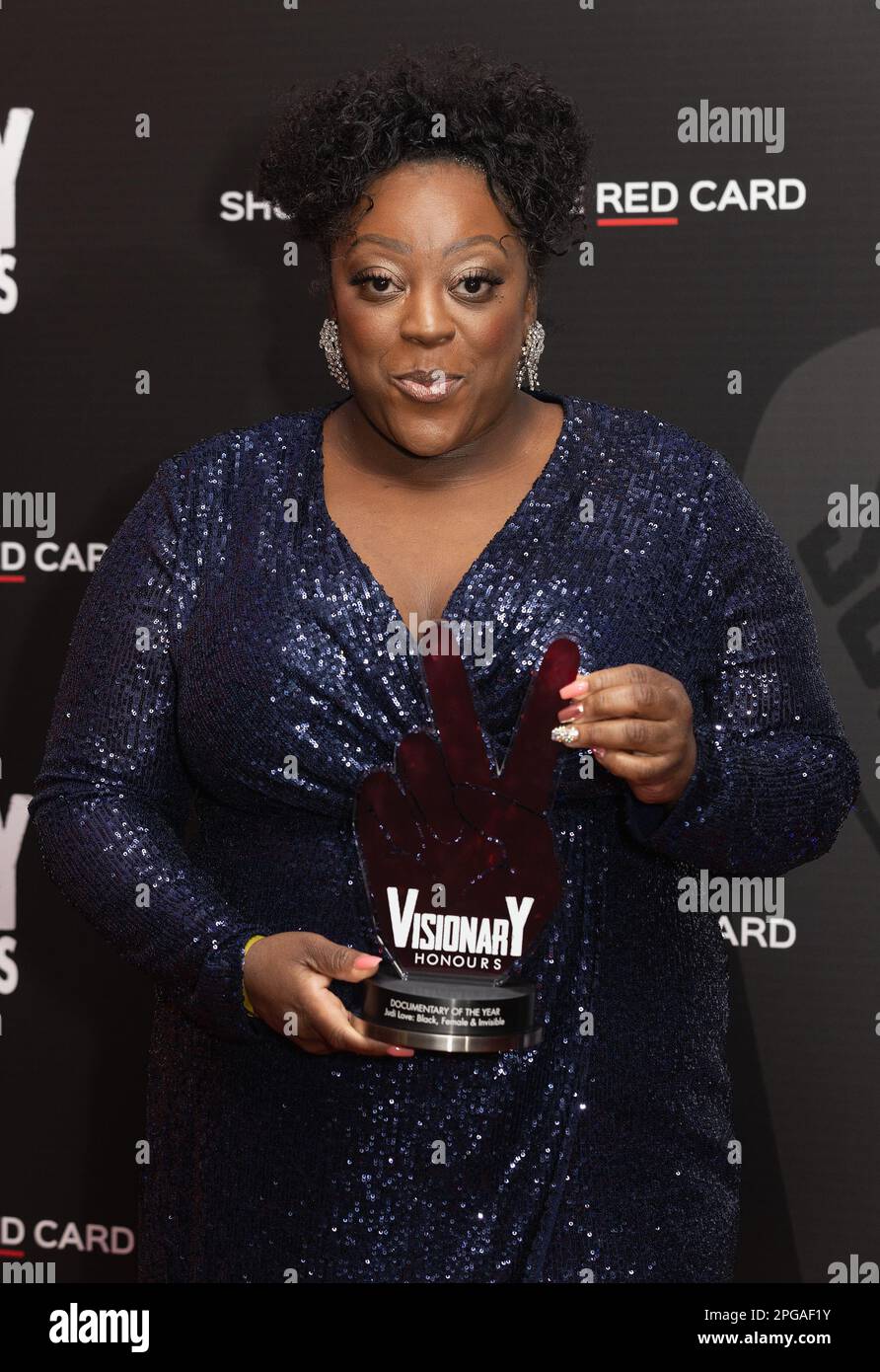 Judi Love with her award for Documentary of the Year at the Visionary