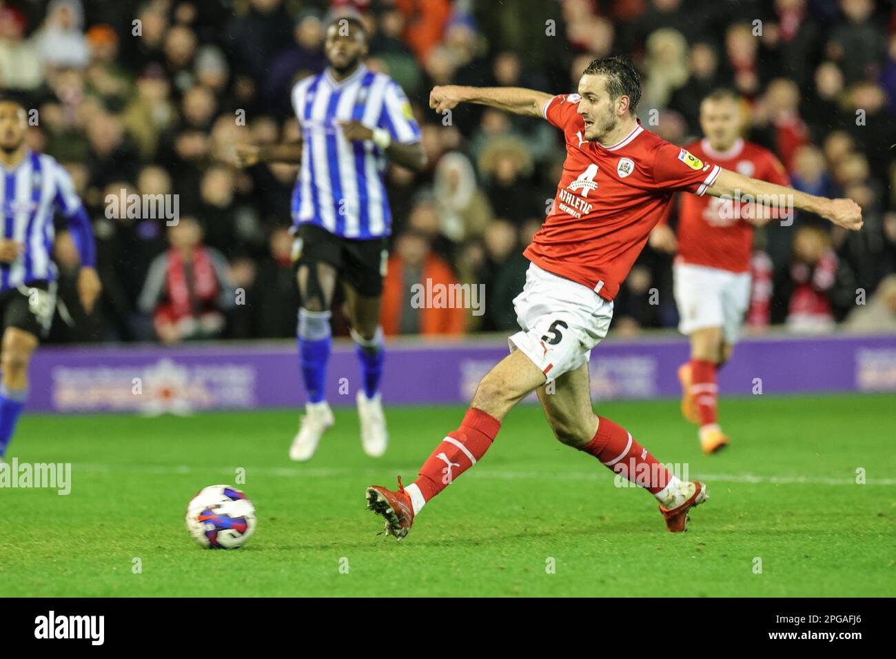 Liam Kitching #5 of Barnsley scores to make it 4-2 during the Sky Bet League 1 match Barnsley vs Sheffield Wednesday at Oakwell, Barnsley, United Kingdom, 21st March 2023  (Photo by Mark Cosgrove/News Images) Stock Photo
