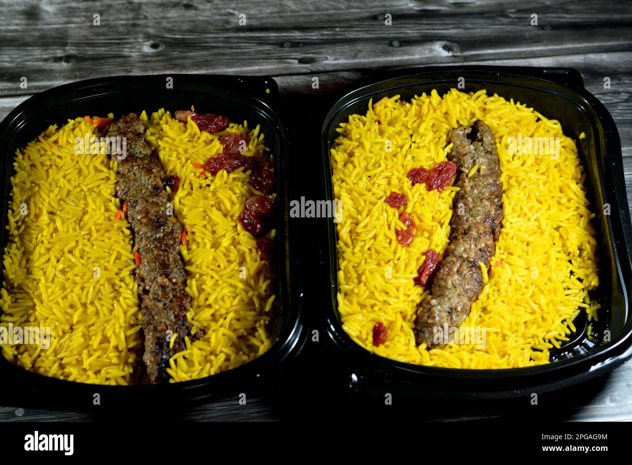 Arabic cuisine traditional food beef  Kofta, kebab and tarb kofta shish which is minced meat with Basmati rice and raisins, oriental grilled barbecued Stock Photo