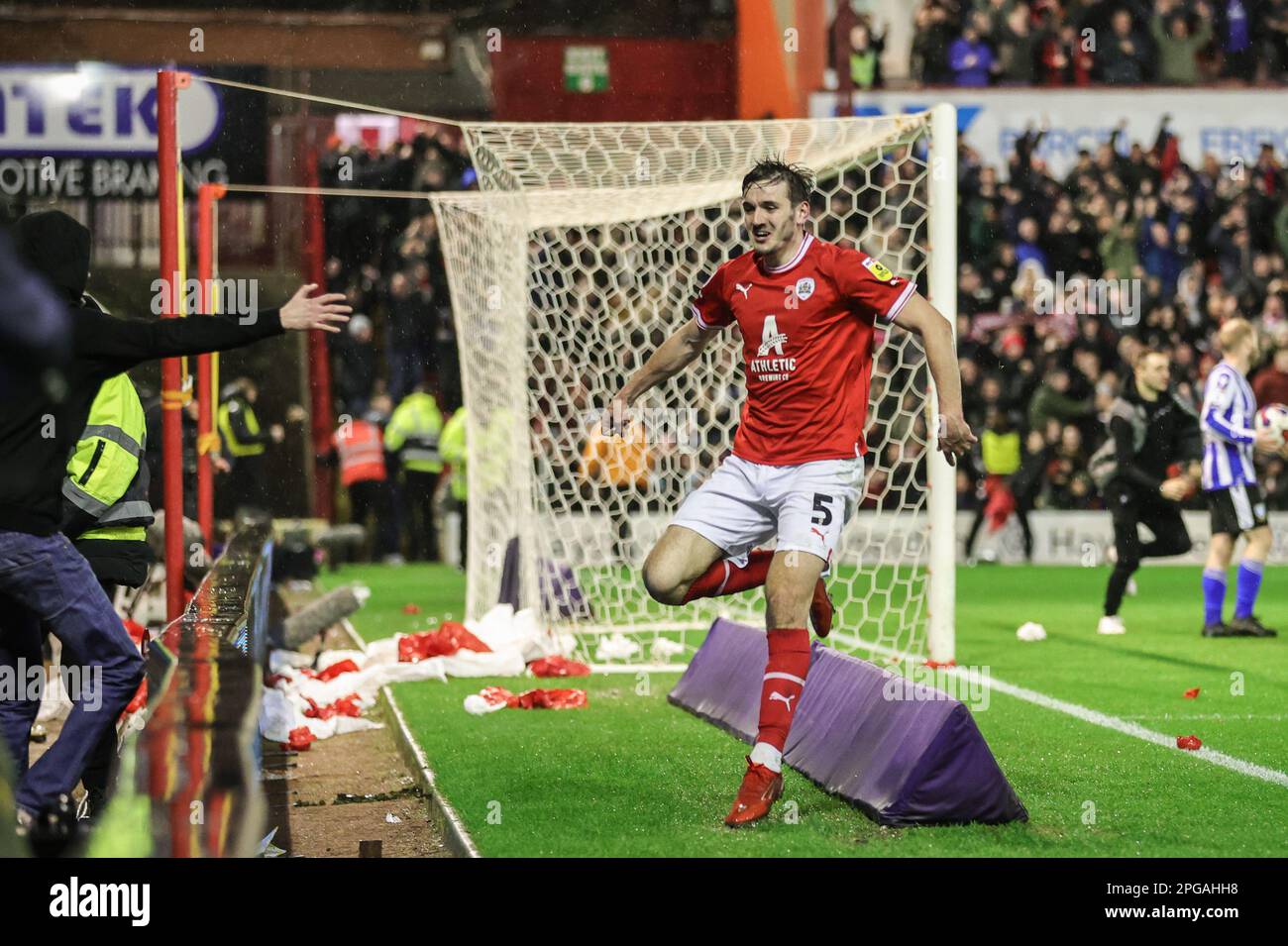 Liam Kitching #5 of Barnsley celebrates his goal to make it 4-2 during the Sky Bet League 1 match Barnsley vs Sheffield Wednesday at Oakwell, Barnsley, United Kingdom, 21st March 2023  (Photo by Mark Cosgrove/News Images) Stock Photo