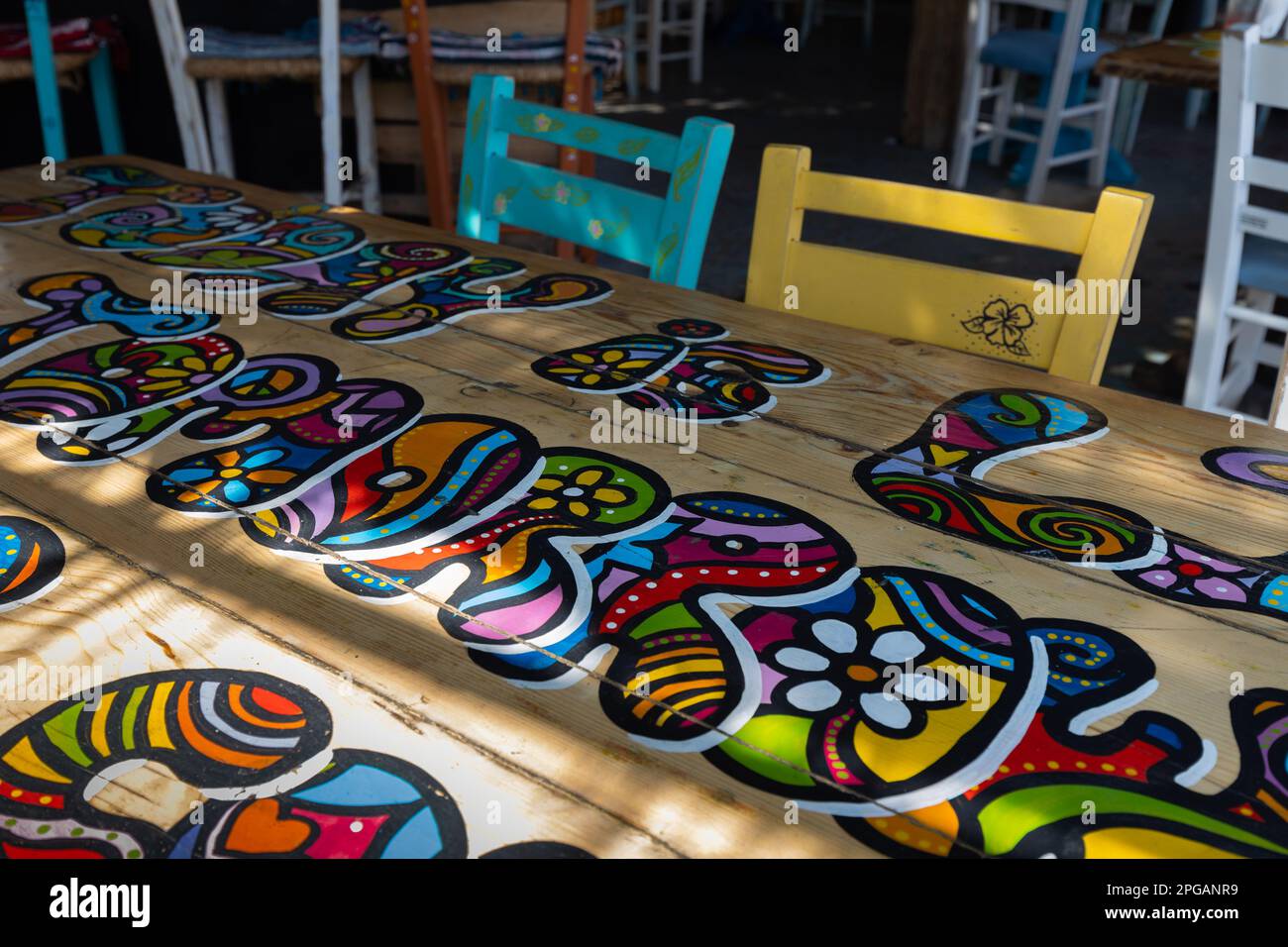 Bright hospitable table with an inscription. Greece Stock Photo Alamy