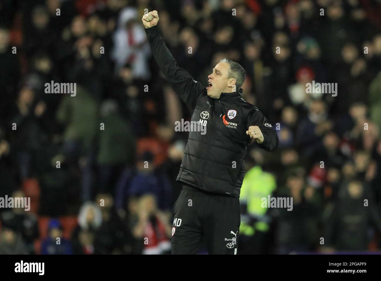 Michael Duff manager of Barnsley punches the air after Barnsley win 4-2 during the Sky Bet League 1 match Barnsley vs Sheffield Wednesday at Oakwell, Barnsley, United Kingdom, 21st March 2023  (Photo by Alfie Cosgrove/News Images) Stock Photo