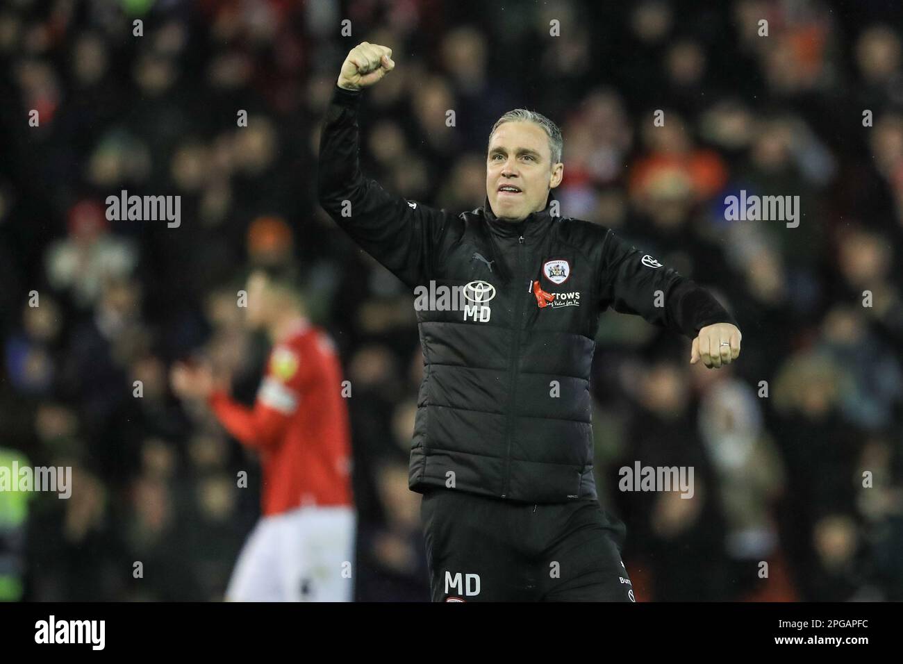 Michael Duff manager of Barnsley punches the air after Barnsley win 4-2 during the Sky Bet League 1 match Barnsley vs Sheffield Wednesday at Oakwell, Barnsley, United Kingdom, 21st March 2023  (Photo by Alfie Cosgrove/News Images) Stock Photo