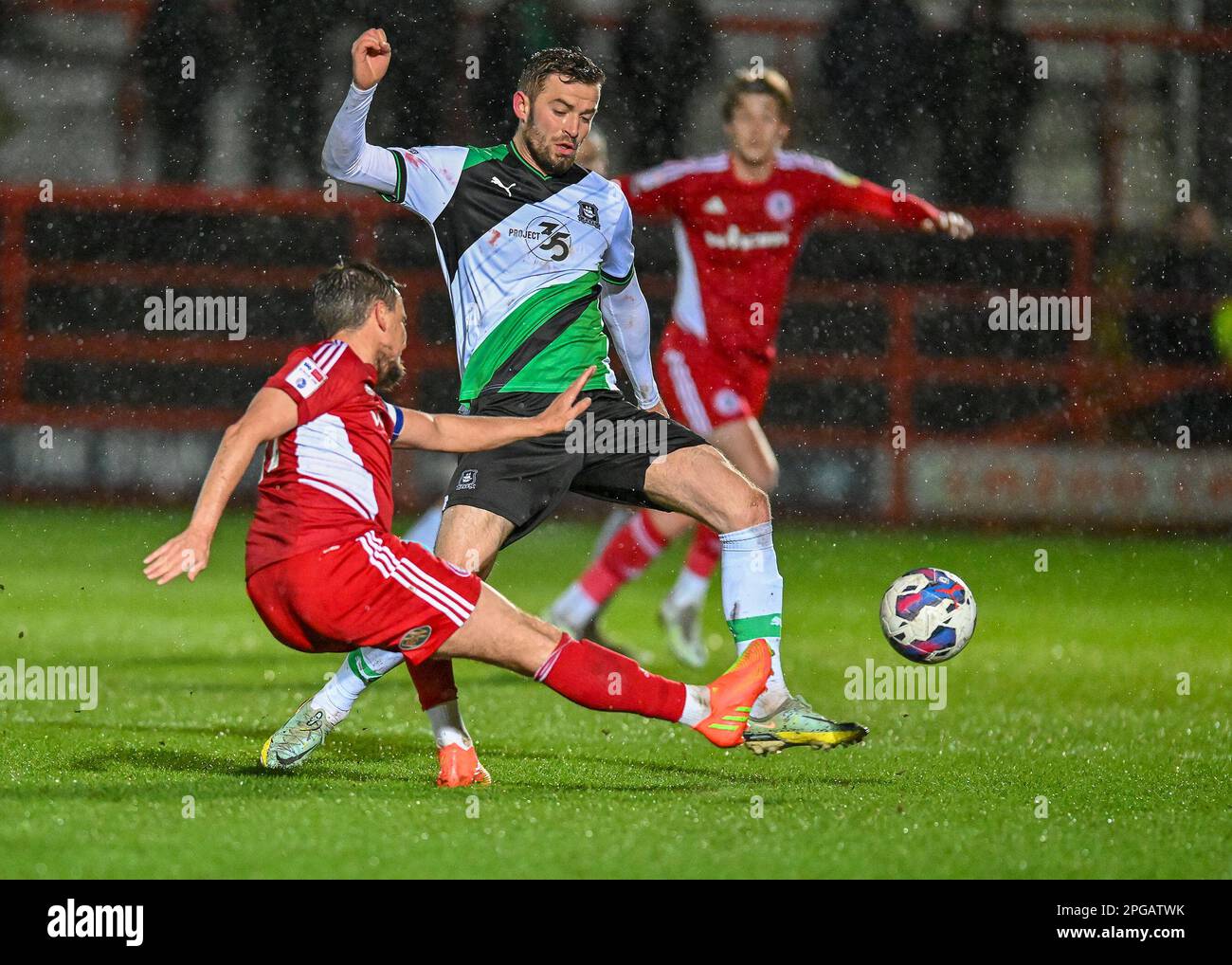 Matt Butcher#7 of Plymouth Argyle defending during the Sky Bet League 1 match Accrington Stanley vs Plymouth Argyle at Wham Stadium, Accrington, United Kingdom, 21st March 2023  (Photo by Stan Kasala/News Images) Stock Photo