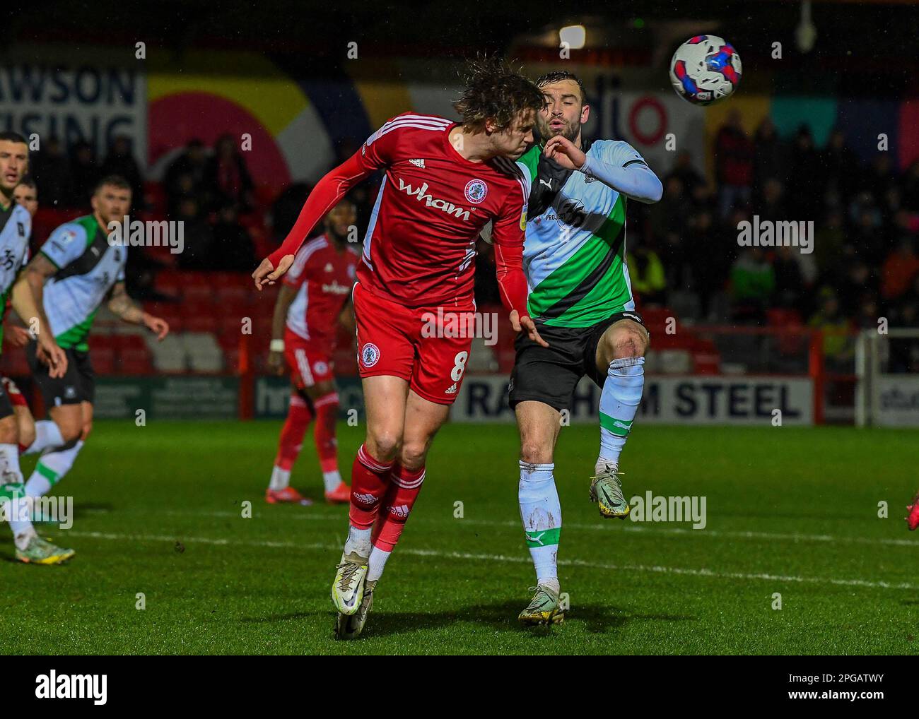 Matt Butcher#7 of Plymouth Argyle battles for the ball during the Sky Bet League 1 match Accrington Stanley vs Plymouth Argyle at Wham Stadium, Accrington, United Kingdom, 21st March 2023  (Photo by Stan Kasala/News Images) Stock Photo