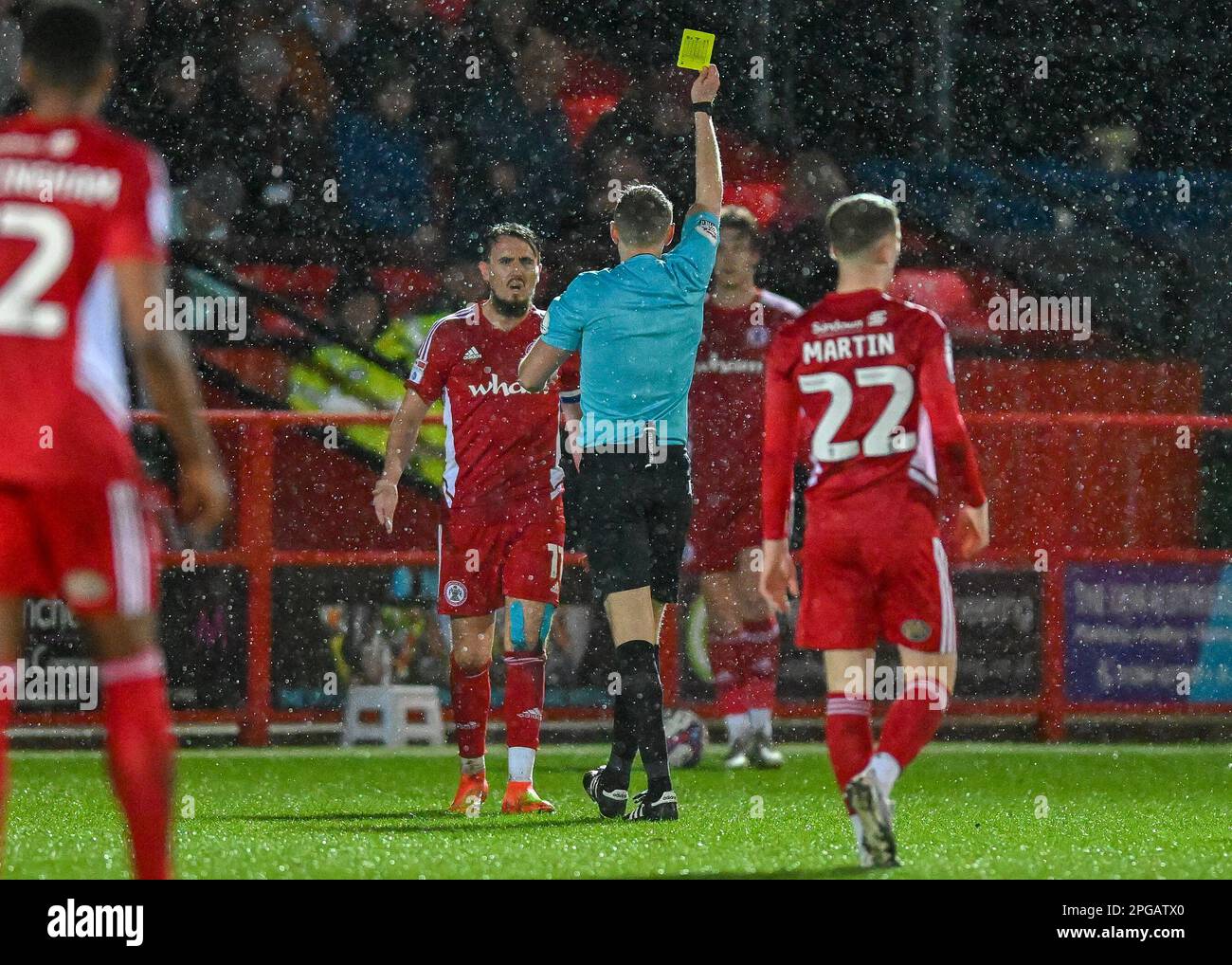 Sean McConville #11 of Accrington Stanley receives a yellow card during the Sky Bet League 1 match Accrington Stanley vs Plymouth Argyle at Wham Stadium, Accrington, United Kingdom, 21st March 2023  (Photo by Stan Kasala/News Images) Stock Photo